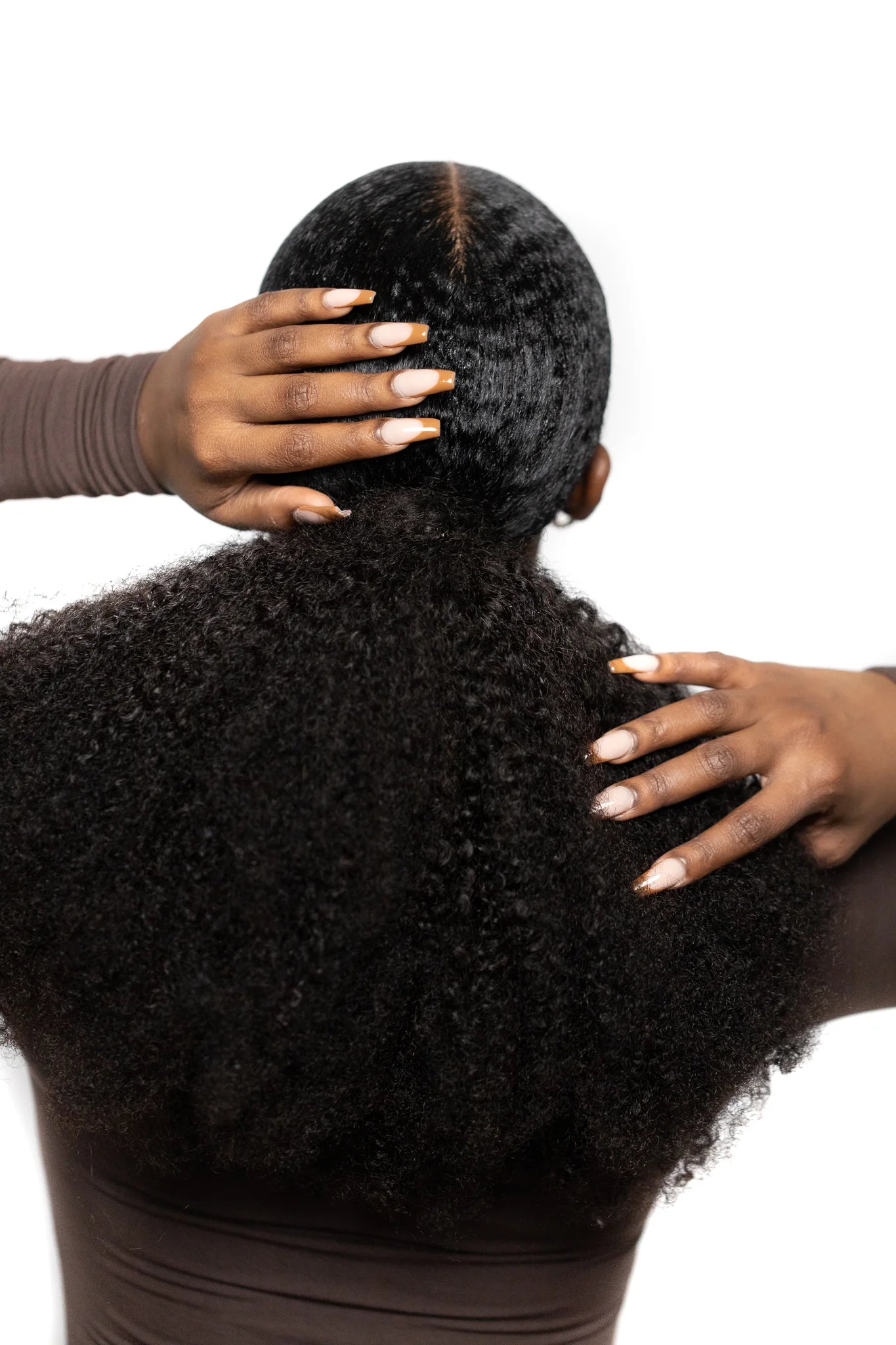 Afro Kinky Coily wrapped ponytail back view on model
