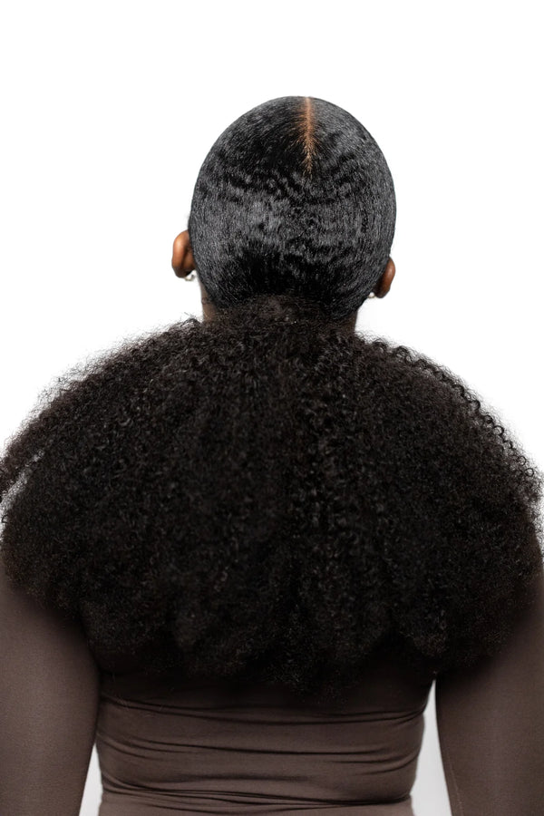 Afro kinky coily wrapped ponytail back view